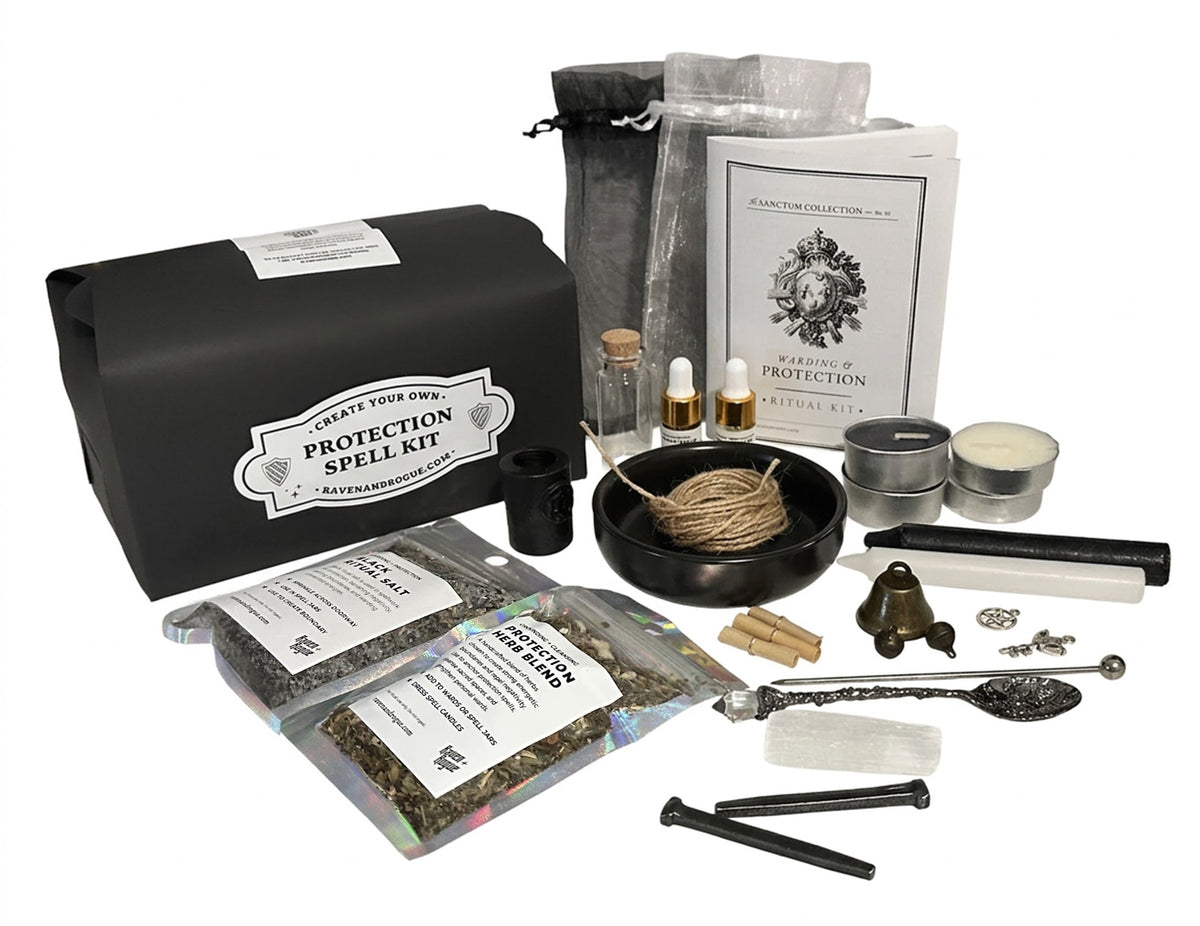 A Protection Spell Kit by Raven and Rogue shown with its black branded box, pouch, booklet, herbs in bags, candles, bowls, tools, and other ritual components arranged on a white background.